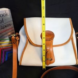 Dooney and Bourke small, cream shoulder bag